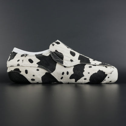 Close-up of cowhide texture and carbon base