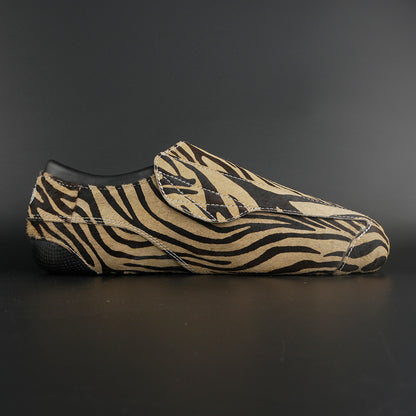 Close-up of Genuine Leather with Fur & Zebra Print Style and carbon base