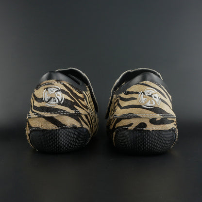 Skater wearing Envy Cow Zebra Print Style Roller Skates in motion